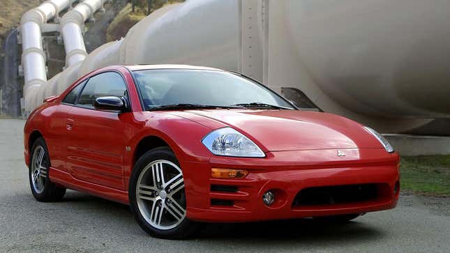 A photo of a red Mitsubishi Eclipse sports car. 